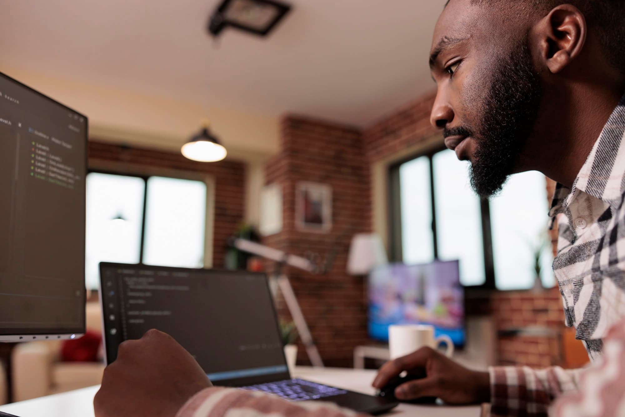 Software engineer at Data Leap Technologies writing code in Accra
